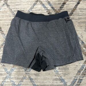 Grey lululemon ABC short hemmed to 5” inseam.